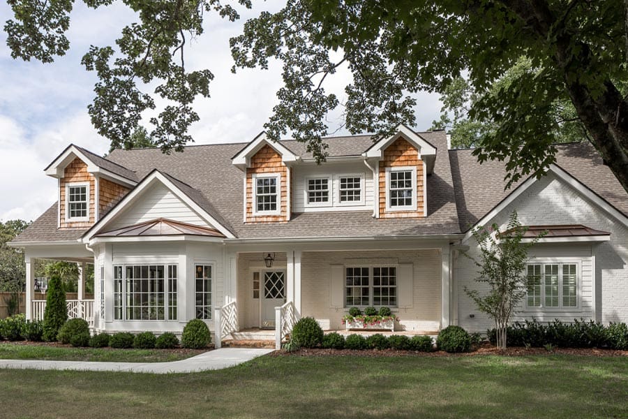 Architecture of upscale white home with cedar planks near Nashville, Tennessee