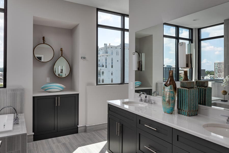 Bathroom with dark gray cabinets and view of Nashville, Tennessee
